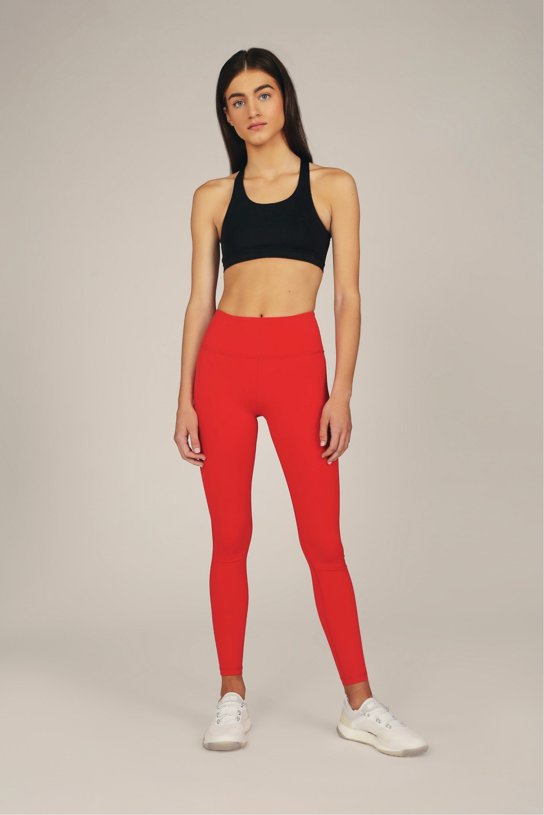 Premium Photo  Athletic Latina Model Wearing Red Leggings on